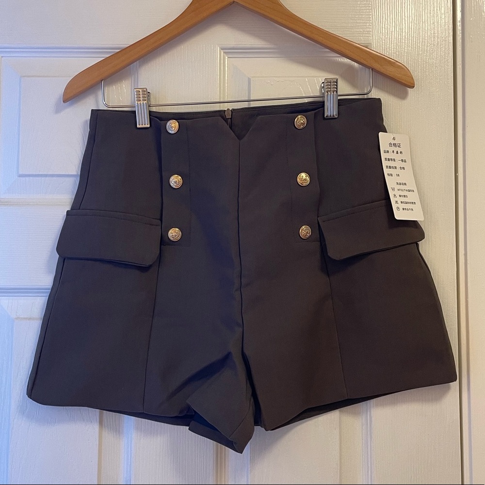 Khaki shorts with gold buttons